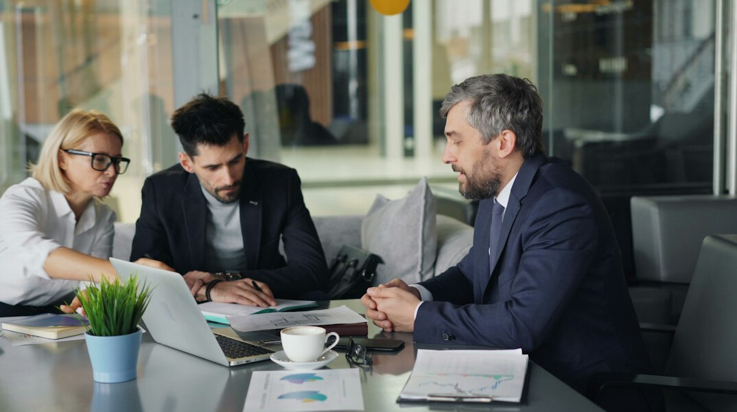 insurance professionals analyzing data